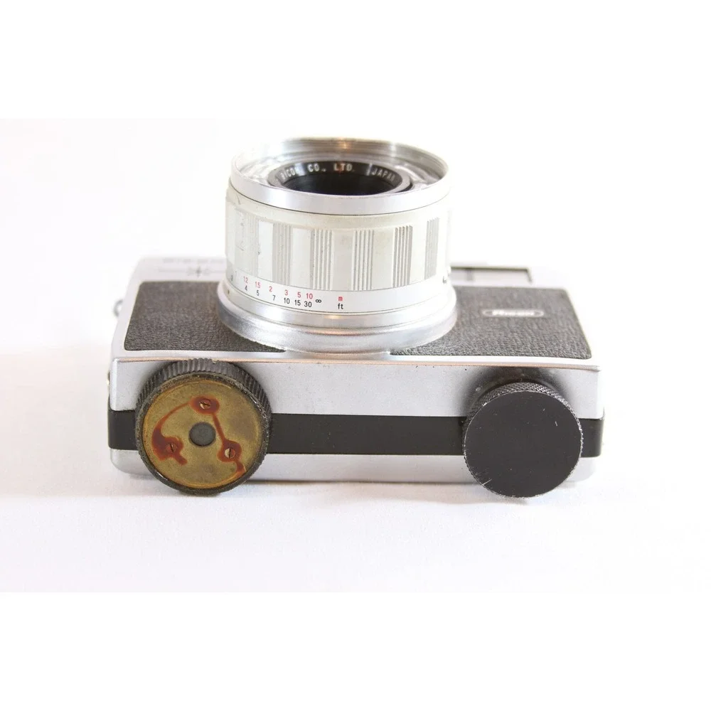 Ricoh 126 C Automatic Film Camera Rikenon 40mm f2.8 Lens Silver Japan Vintage